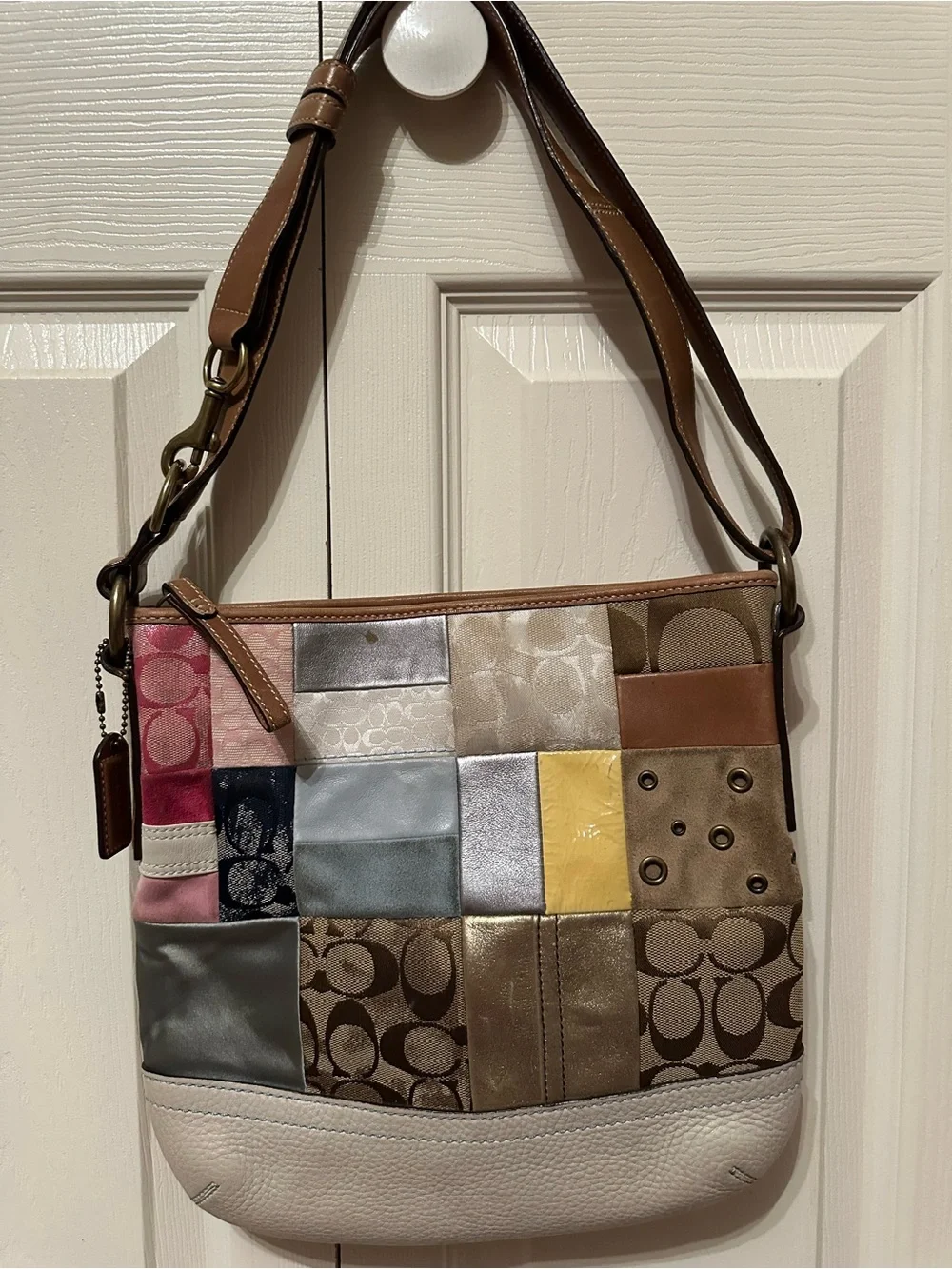 Coach Patchwork Signature Shoulder Bag with matching hat.